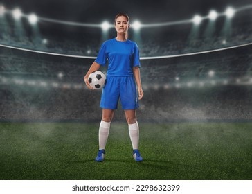  Portrait of young female soccer player with soccer ball standing in a big stadium. - Powered by Shutterstock