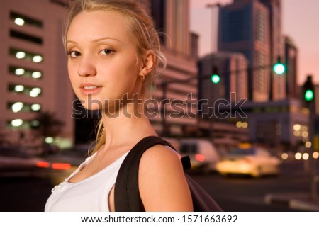 Portrait of a young female tourist