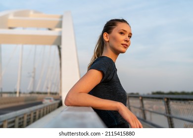 Portrait Of Young Fit Attractive Happy Fitness Woman In City. People Healthy Lifestyle Concept.