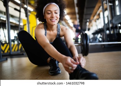 Portrait Of Young Fitness Woman In Gym