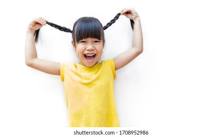 Portrait Of Young Fun Happy Little Cute Asian Girl In Isolated On White Background With Copy Space. Education For Toddler Or Preschool, Childhood Healthy Lifestyle, Back To School Concept