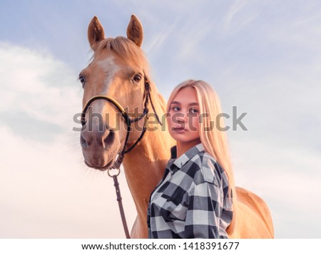 Similar – Image, Stock Photo Portrait of adult woman with beautiful horse in nature. Sunlight, silhouette.Concept of love for lesser brothers, caring and animal training