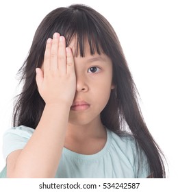 Portrait Of A Young Girl Covering Face With Hands, Close One Eye