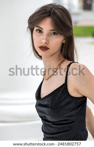 Similar – Young girl posing outdoor