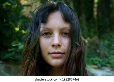 Portrait of a young girl of natural beauty-without makeup and hairstyle