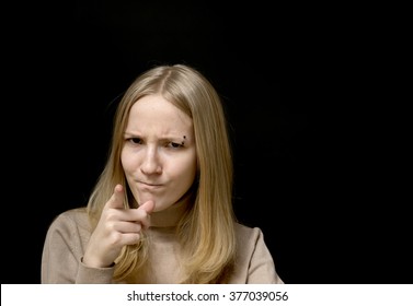 Portrait Of A Young Girl 
On Black Background