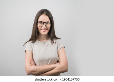 Portrait Of A Young Girl Smiling On A White Background