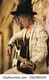 A Portrait Of A Young Guitarist In The Street. Casual Summer Fashion, Music.