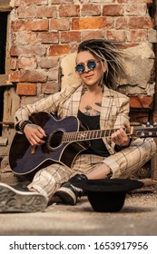 A Portrait Of A Young Guitarist In The Street. Casual Summer Fashion, Music.