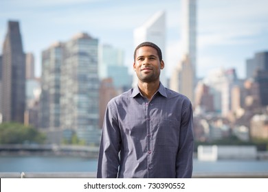 Portrait Of Young Handsome African American Man With NYC Skyline In The Background, Photographed In September 2017