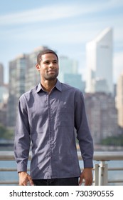 Portrait Of Young Handsome African American Man With NYC Skyline In The Background, Photographed In September 2017