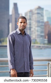 Portrait Of Young Handsome African American Man With NYC Skyline In The Background, Photographed In September 2017