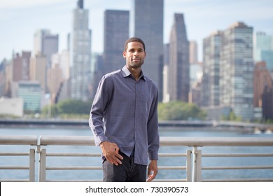 Portrait Of Young Handsome African American Man With NYC Skyline In The Background, Photographed In September 2017