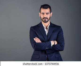 Portrait of young and handsome business man with arms crossed  - Shutterstock ID 1373744936