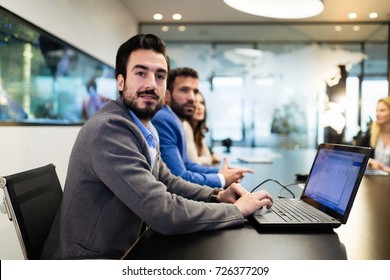 Portrait of young handsome businessman on meeting - Shutterstock ID 726377209
