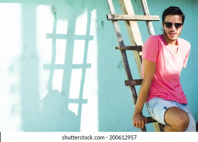 Portrait Of A Young Handsome Man, Fashion Model,  In Urban Background