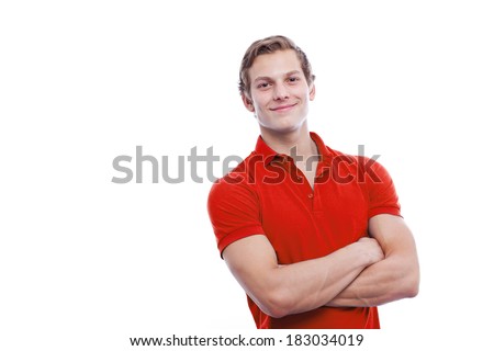 Portrait of a young handsome man wearing red t-short isolated on white background