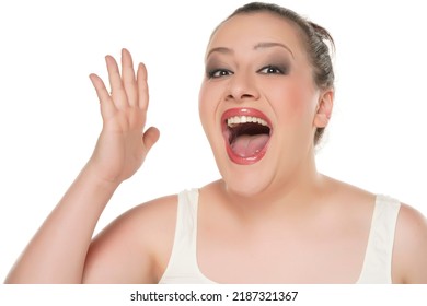 Portrait Of A Young Happy Chubby Woman With Makeup On A White Background.