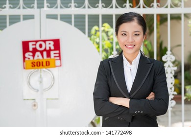 Portrait Of A Young Happy Realtor Having Sold A House