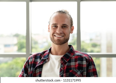 Portrait Of Young Happy Short Stylish Bearded Caucasian Man Or Creative Designer Smiling And Looking At Camera Feeling Confident In Casual Outfit. Headshot Of Male Employee, Entrepreneur Or Student.