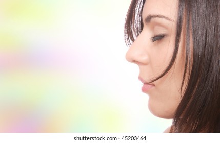 Portrait of a young happy woman over pastel background - Shutterstock ID 45203464