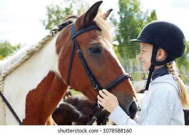 Portrait of young horsewoman and brown horse. Girl with horse. - Powered by Shutterstock