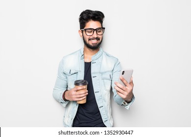 Portrait Of Young Indian Man Making Video Call From The Phone Isolated On White Background