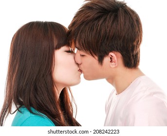 portrait of young kissing couple