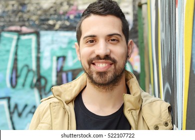 Portrait Of Young Latin Man. Urban Scene.