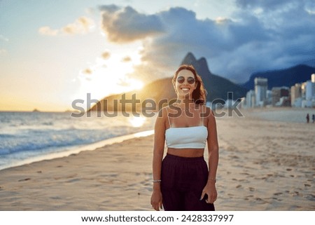 portrait young latin smiling woman on Ipanema beach
