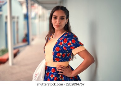 portrait young latin woman looking at the camera dressed with chilean national custome close up