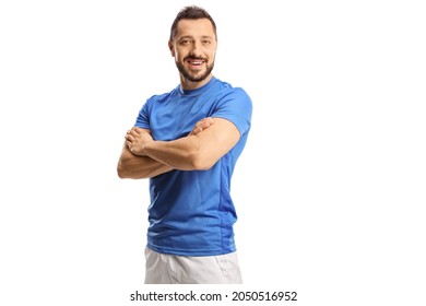 Portrait of a young male athlete in a blue jersey posing with crossed hands isolated on white background - Powered by Shutterstock