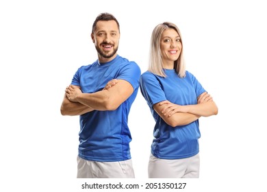 Portrait of a young male and female wearing blue sport jersey and posing with crossed hands isolated on white background