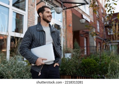 Portrait Of A Young Male IT Specialist With A Laptop Not An Office, Entrepreneurship Development And Business Planning Concept