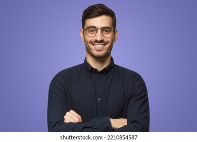 Portrait Of Young Male Teacher In Black Shirt Isolated On Purple Background