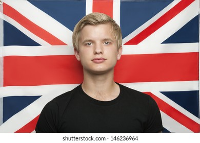 Portrait Of Young Man Against British Flag