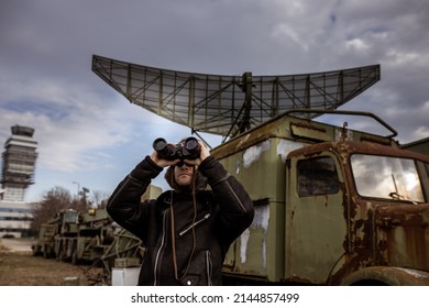 Portrait Of Young Man Airplane Pilot. Airplane On The Background.Old Fashion Style.