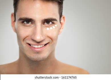 Portrait Of Young Man With Anti- Aging Cream, Skincare