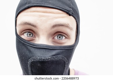 Portrait Of A Young Man In A Black Balaclava