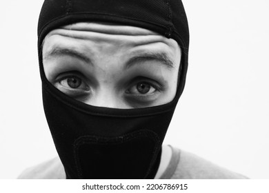 Portrait Of A Young Man In A Black Balaclava