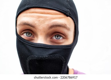 Portrait Of A Young Man In A Black Balaclava