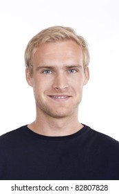Portrait Of A Young Man With Blond Hair And Blue Eyes - Isolated On White