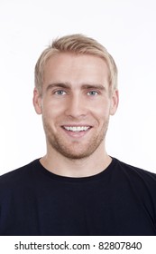 Portrait Of A Young Man With Blond Hair And Blue Eyes - Isolated On White