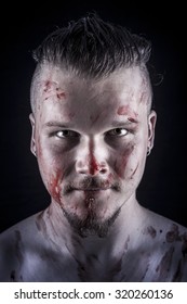 portrait of a young man with blood