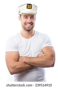 Portrait Of A Young Man With A Boat Captain Cap