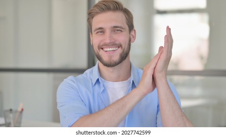 Portrait Of Young Man Clapping, Applauding 