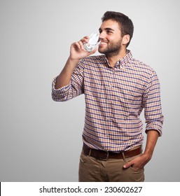 Portrait Of A Young Man Drinking A Water Glass