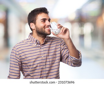 Portrait Of A Young Man Drinking A Water Glass