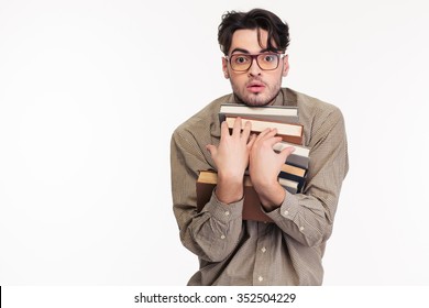 Portrait Of A Young Man In Glasses Holding Many Books Isolated On A White Background