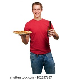 portrait of a young man holding a pizza and a beer over a white background